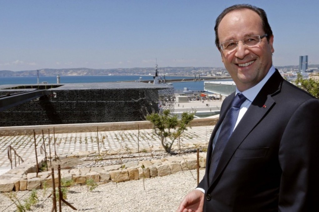 Hollande makes first Japan visit