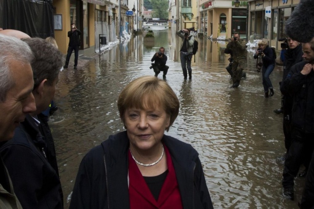 Dr Angela Merkel inspects the town of Pirna. Photo: Reuters