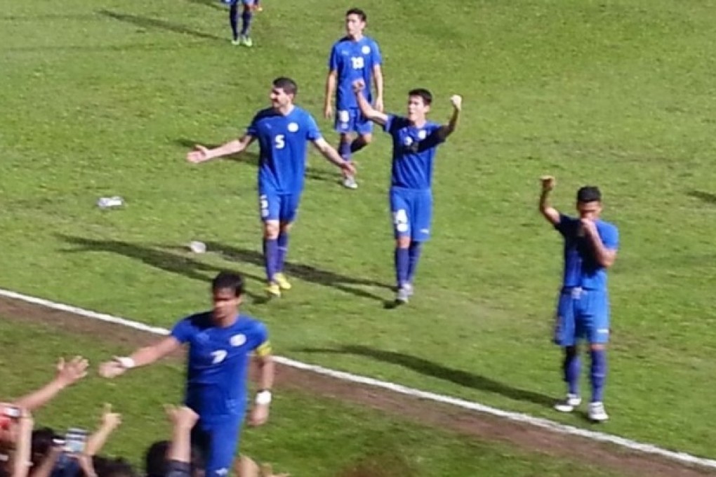The Philippine Azkals celebrate after beating Hong Kong 1-0 on Tuesday night. Photo: Randy Laurea
