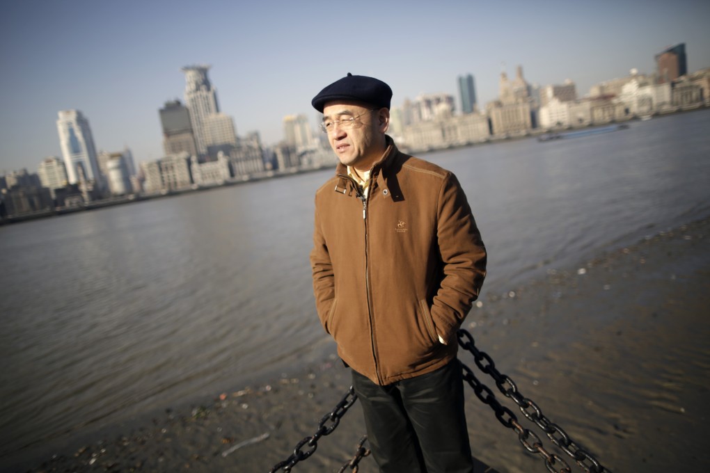 Chinese-born US scientist Hu Zhicheng stands at the waterfront promenade in January in Shanghai. After his release from jail, Hu moved to Shanghai and worked for the company that employed him. He was allowed to travel freely within the country, but he could not leave. Photo: AP