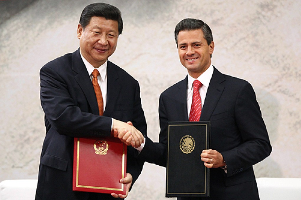 President Xi Jinping shakes hands with Mexican counterpart Enrique Pena Nieto after they signed a joint statement. Photo: Xinhua