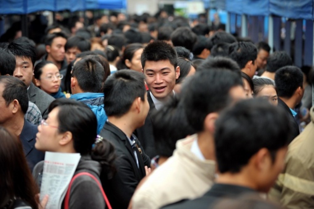 Job seekers attend a job fair in Haikou, Hainan province, in 2012. Photo: Xinhua