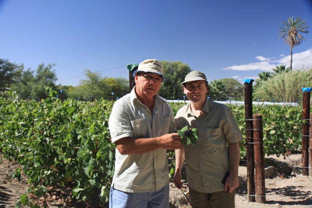 Viens (right) at winemaker Allan Walken-Davis' (left) vineyard in Namibia. Photo: Maria Conti