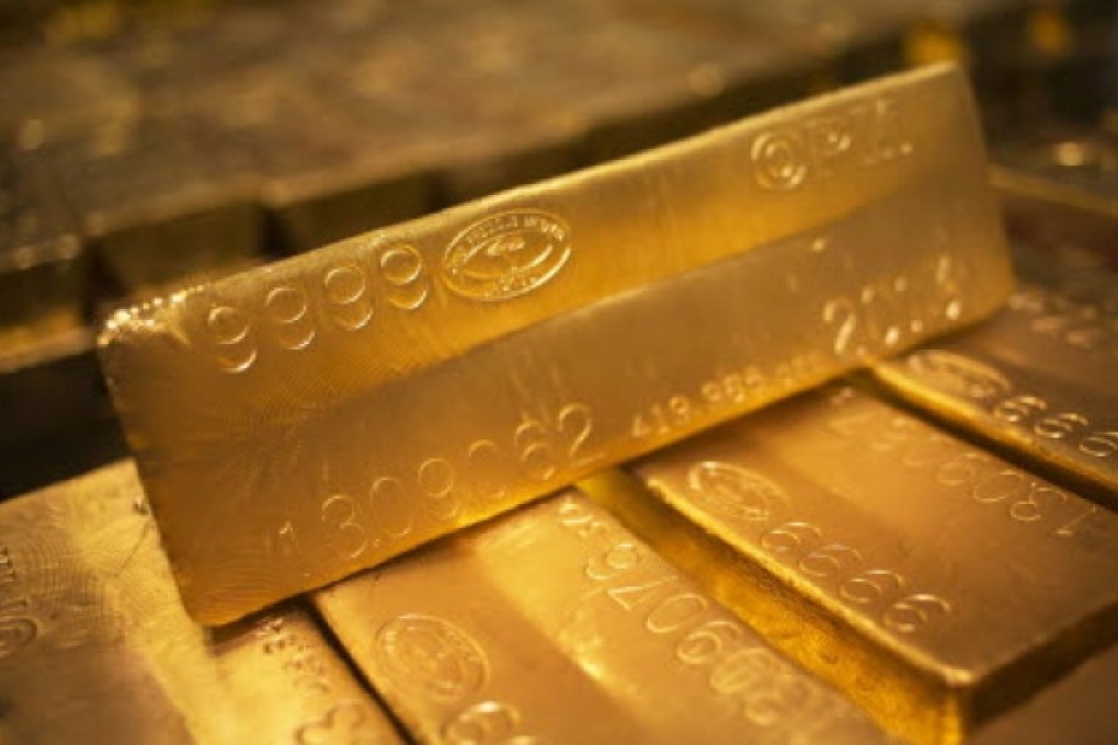 Some 24 karat gold bars in the United States. Two Israelis were jailed on Thursday for laundering gold bars and diamonds in Hong Kong. Photo: Reuters