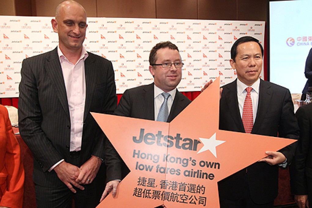 (From left) Jetstar chief executive Bruce Buchanan, Qantas chief executive Alan Joyce and China Eastern Airlines chairman Liu Shaoyong. Photo: Sam Tsang