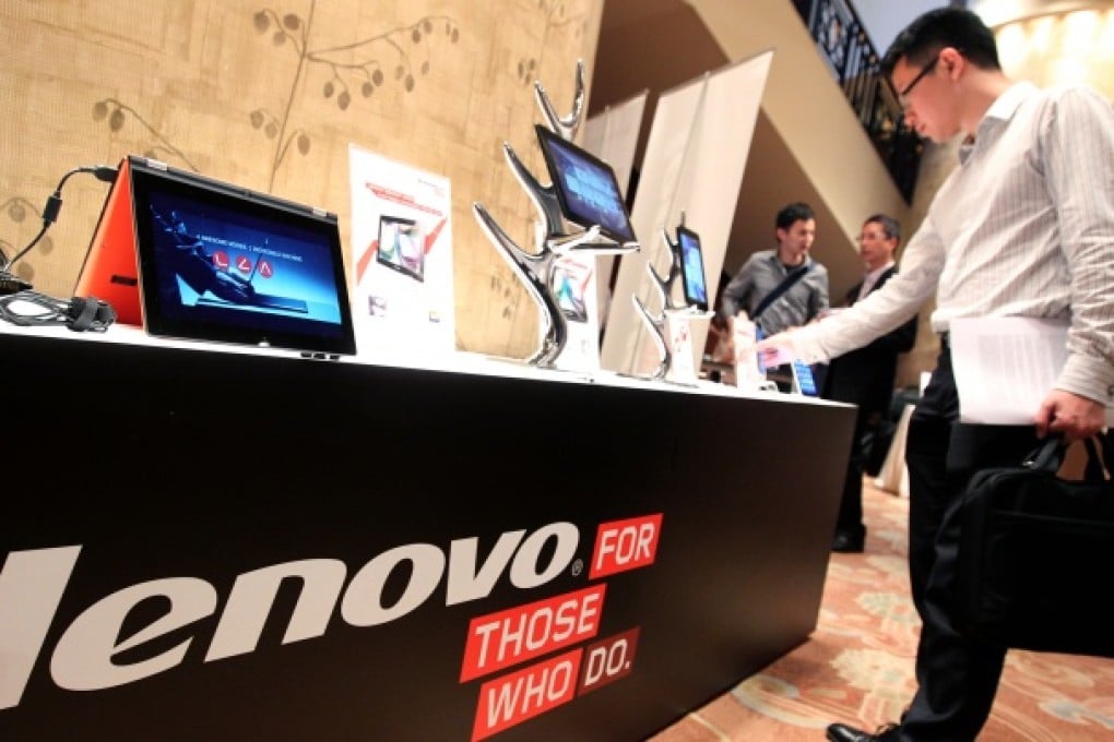 Lenovo tablets and mobile phones are displayed during a news conference. Photo: SCMP Pictures