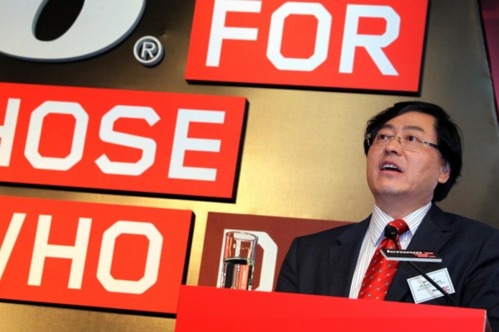 Yang Yuanqing, chairman and chief executive officer of Lenovo, speaks at a news conference in Hong Kong last month. Photo: May Tse