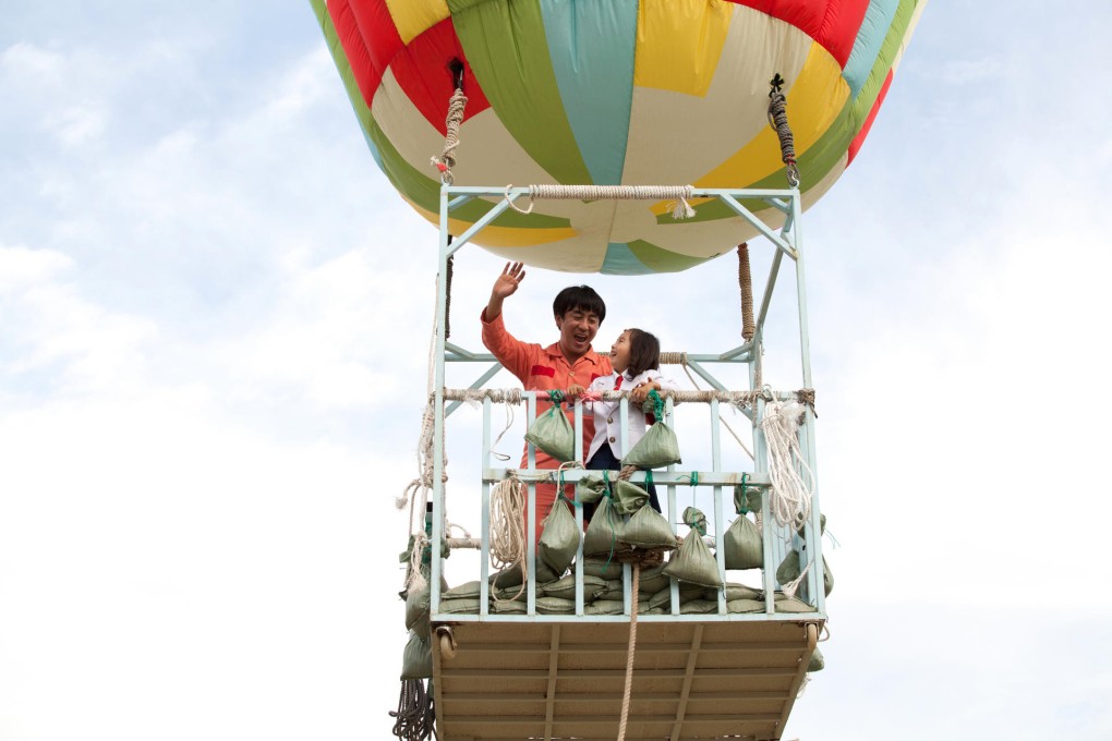 Ryu Seung-ryong and young co-star Gal So-won in Miracle in Cell No 7.
