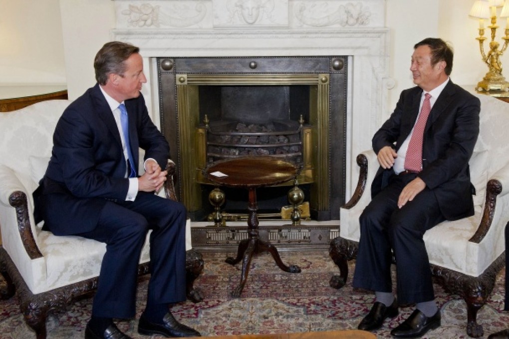 Huawei CEO and founder Ren Zhengfei (right) meeting with British Prime Minister David Cameron in London last year. Photo: AFP