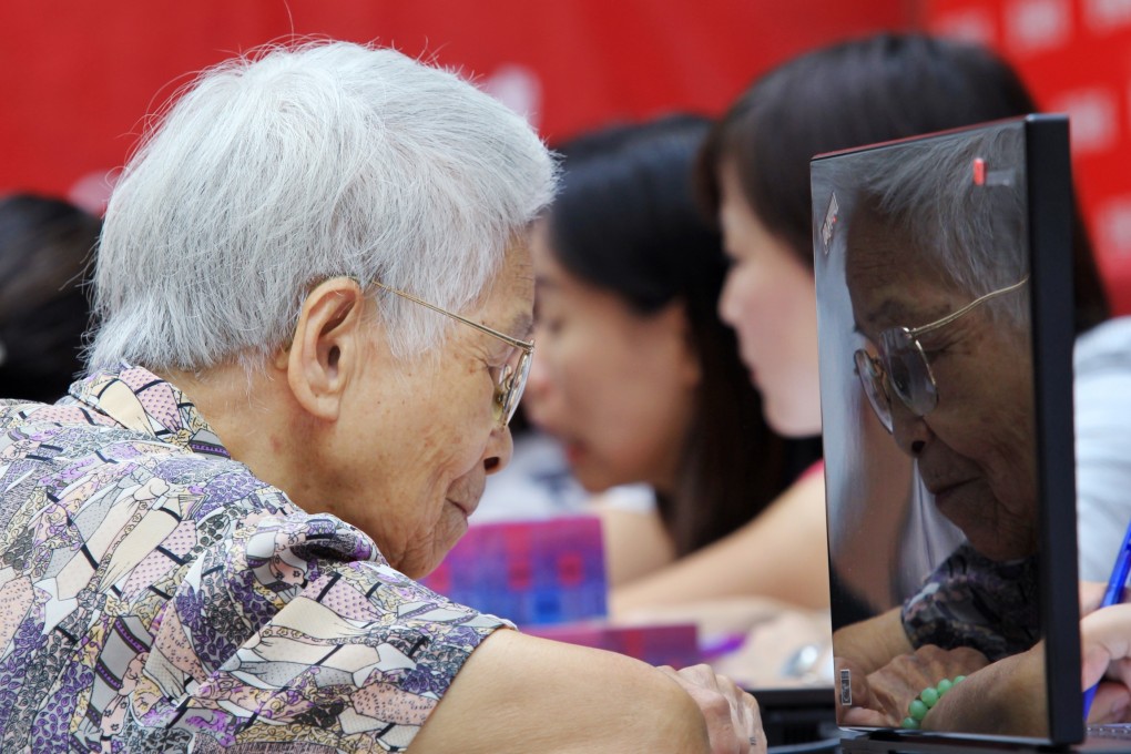 An elderly woman participates in a survey on dementia during in Hong Kong.  Around 9.19 million people in China had dementia in 2010. Photo: Edward Wong