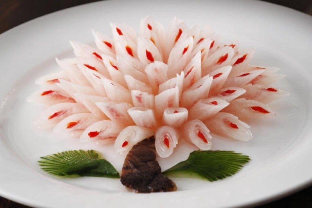 Appetiser of marinated turnip and red chilliat Shanghai Lu Yang Cun in Causeway Bay