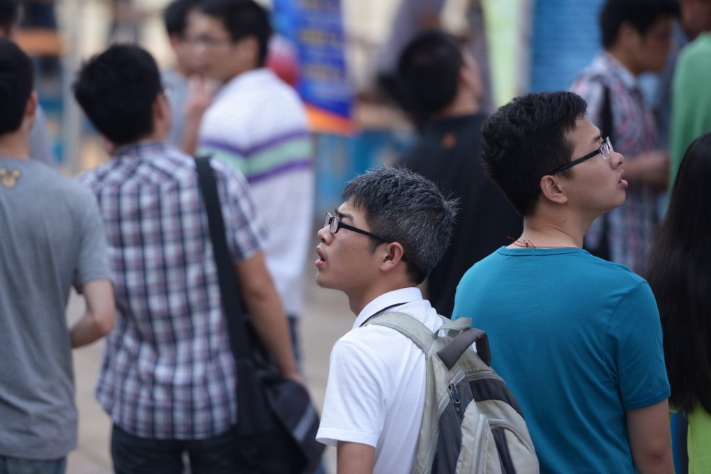 Chinese students overseas are not returning to their motherland to work, claims People's Daily. Photo: Xinhua