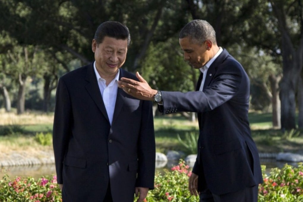 A relaxed Xi Jinping with US President Barack Obama. Obama says military ties have lagged behind talks on other issues. Photo: AP