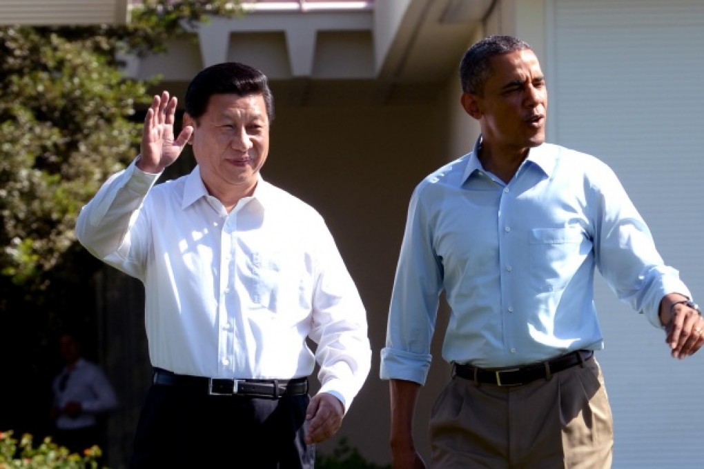 Chinese President Xi Jinping (left) and U.S. President Barack Obama take a walk before heading into their second meeting, at the Annenberg Retreat, California. Photo: Xinhua