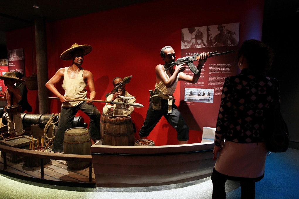 A display of weapons used by pirates through the ages. Photo: Dickson Lee