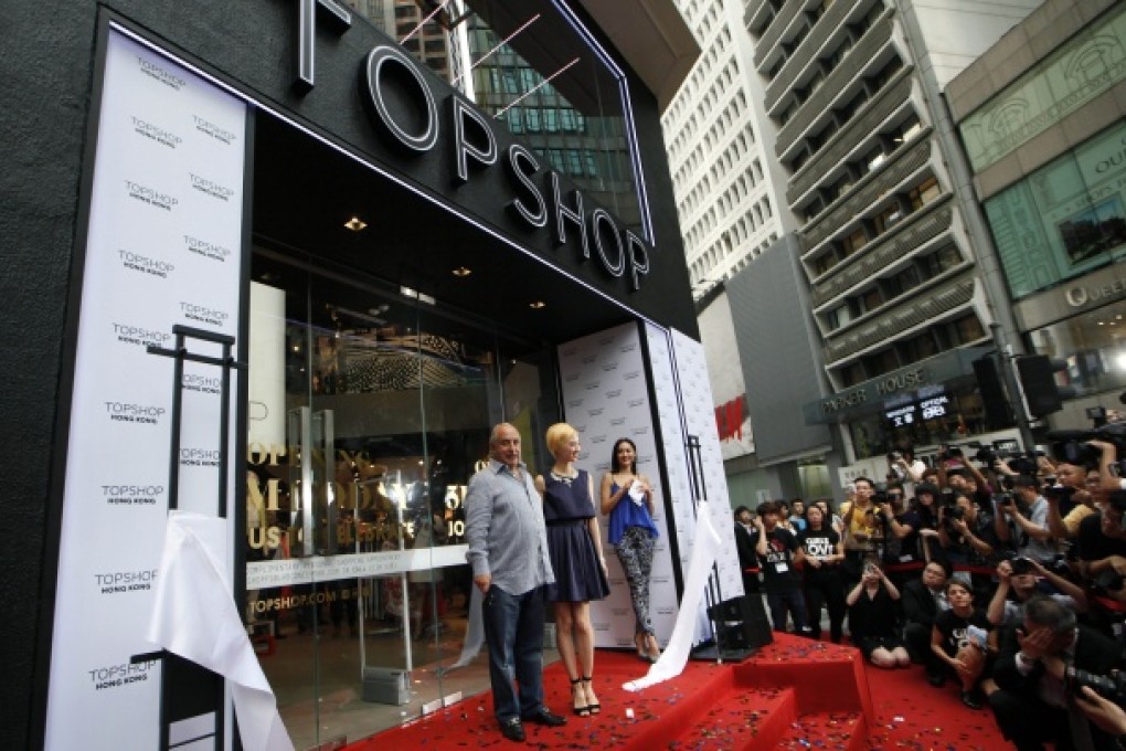 Topshop boss Philip Green, left, and Taiwanese actress Gwei Lun-mei attend the opening ceremony of the first Topshop store in Hong Kong. Photo: AP