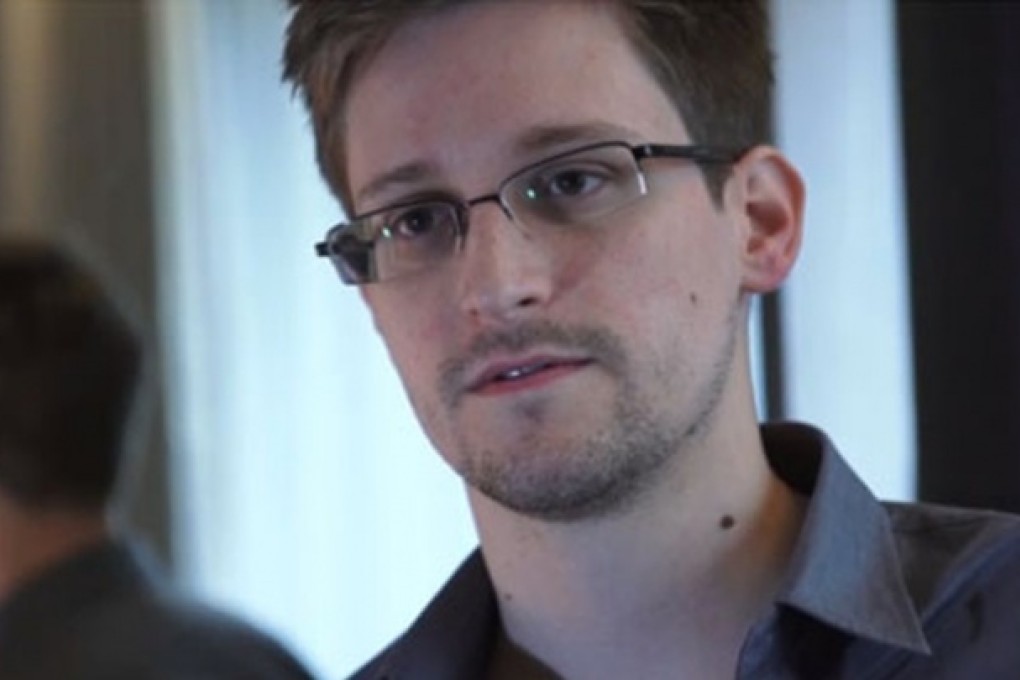 U.S. National Security Agency whistleblower Edward Snowden is seen in this still image taken from a video during an interview with the Guardian in his hotel room in Hong Kong. Photo: Reuters
