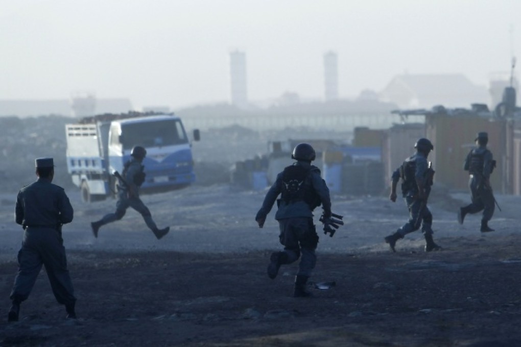 Afghan police arrive at the site of an attack in Kabul. Photo: Reuters