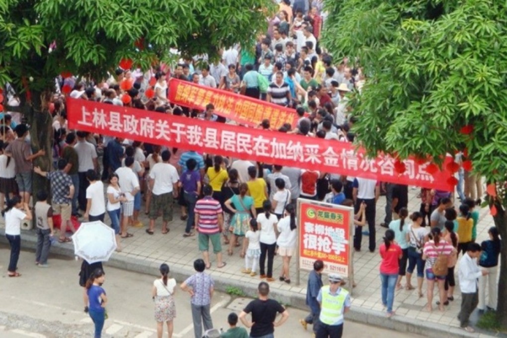 Protesters gather in Shanglin county to demand central government help for relatives caught in strife in Ghana. Photo: SCMP