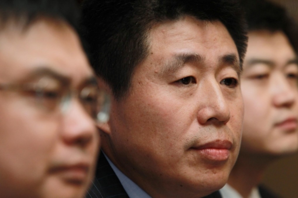 Frank Dai Mingfang (centre)