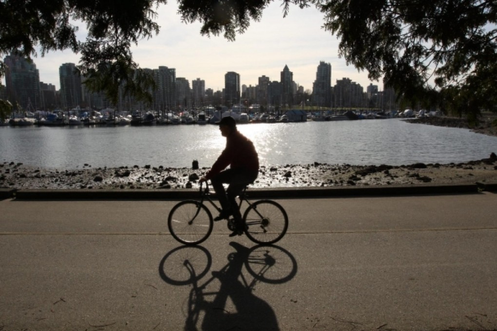 In parts of Vancouver an estimated 23 per cent of flats are empty because the buyers "are so rich they don't even care about the return on their investment". Photo: EPA