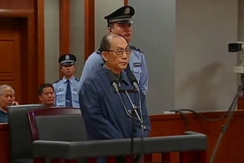 Former Chinese Railways Minister Liu Zhijun stands trial at Beijing No. 2 Intermediate People's Court on Sunday. Photo: AP