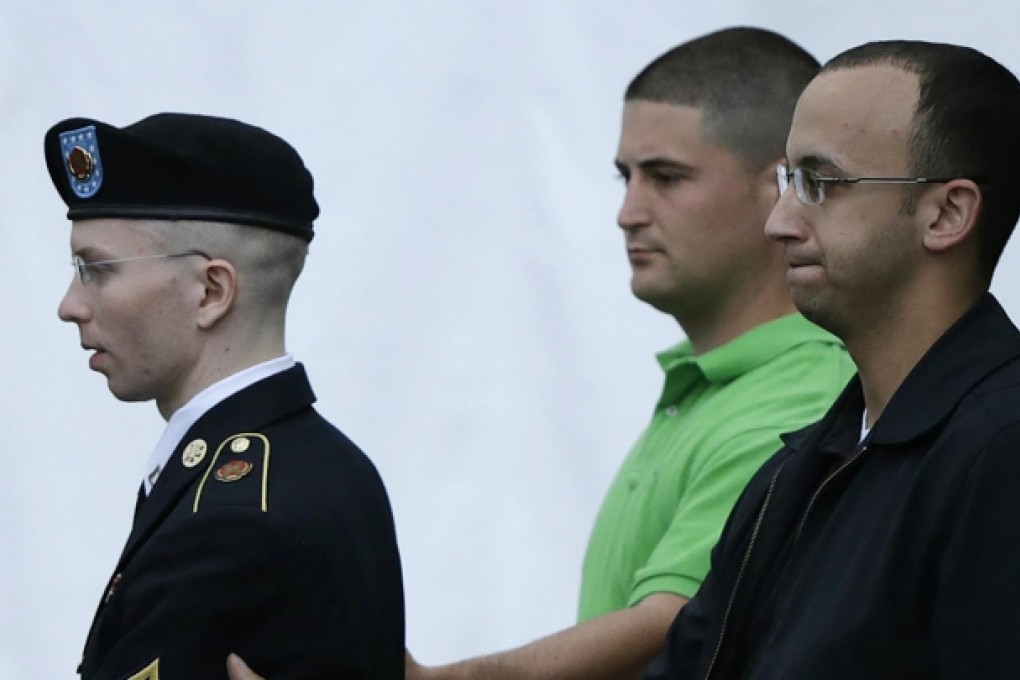 Bradley Manning is taken from the courtroom after day four of his court martial in Fort Meade, Maryland, on Tuesday. Photo: Reuters