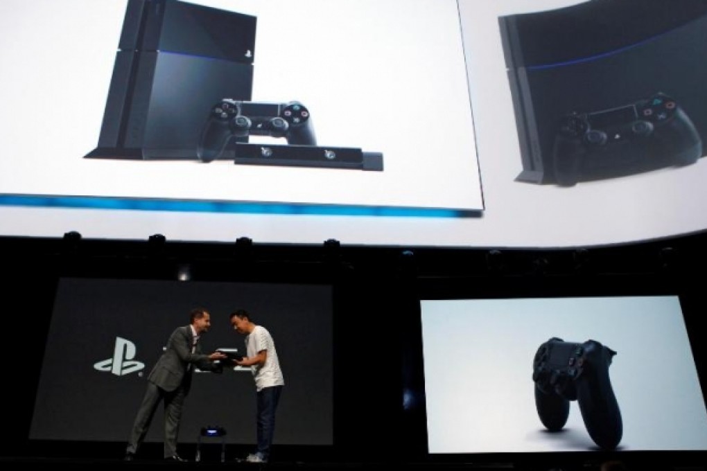 Top Sony executive, Andrew House, unveils the PS4. Photo: Bloomberg
