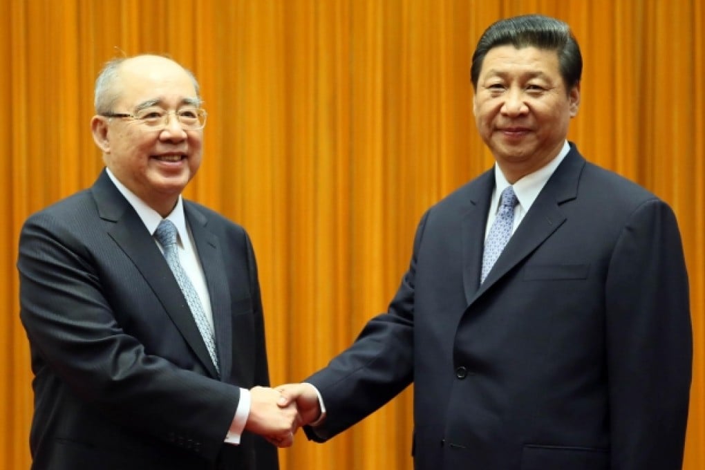 KMT chairman Wu Poh-hsiung (left) meets President Xi Jinping in Beijing yesterday. Photo: Xinhua