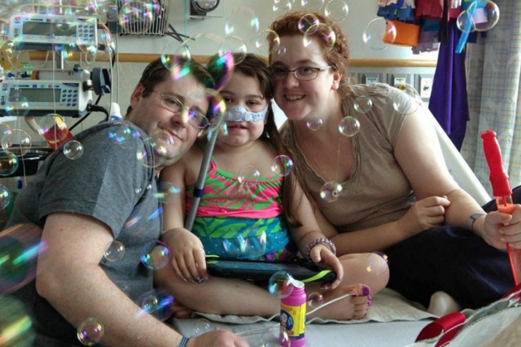 Sarah Murnaghan with parents Fran and Janet. Photo: AP