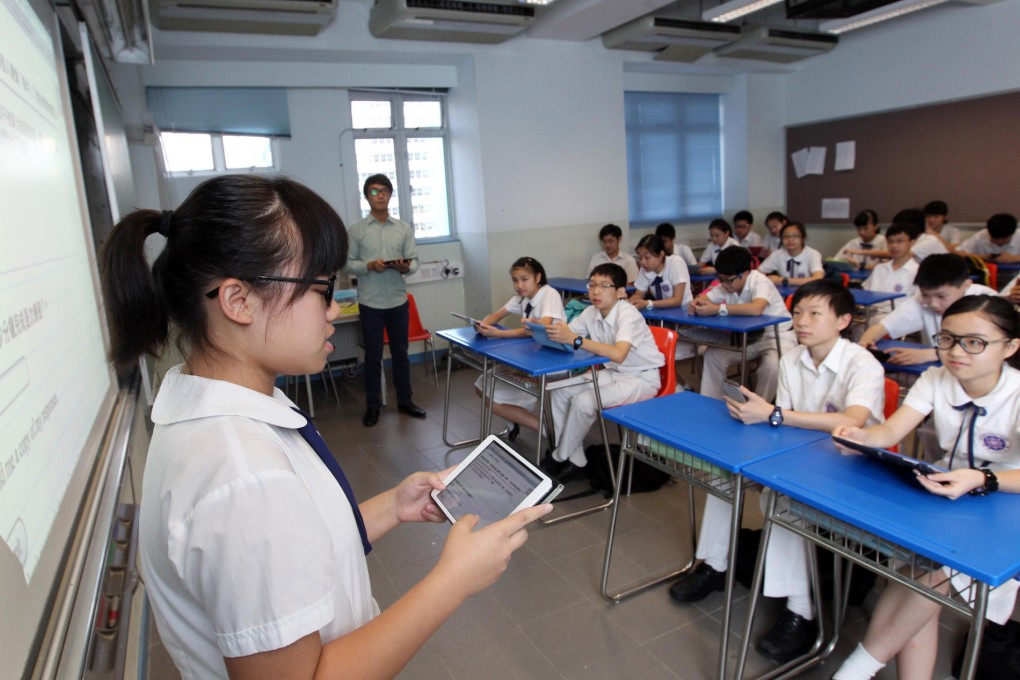 Form 1 students use their iPads at Pui Ching Middle School in Ho Man Tin. Photo: May Tse