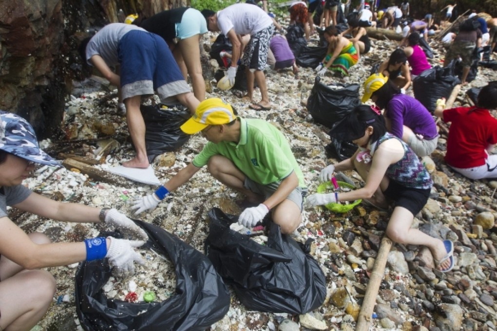 Over 150 volunteers from the Hong Kong based NGO, Ecovision moved 217 full bags of plastic, plastic pellets and assorted marine trash off Big Wave Bay beach last year. Photo: EPA