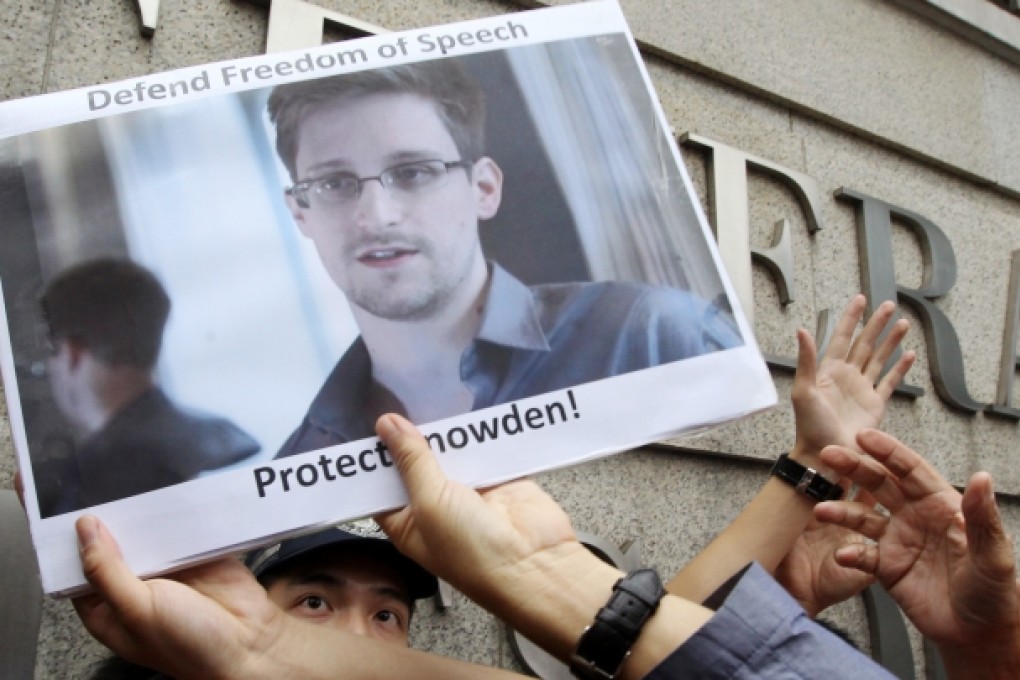 Members of League of Social Democrats gather at HSBC headquarters and march to Consulate General of the United States Hong Kong and Macau (Consulate General of The United States of America) to support Edward Snowden. Photo: Edward Wong