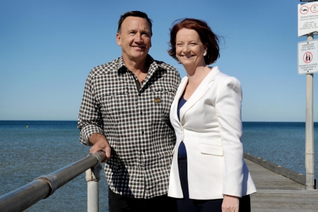Julia Gillard and partner Tim Mathieson the day after Australia's August 22, 2010, election.Photo: AFP