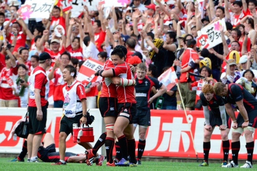 Ayumu Goromaru celebrates after Japan's first win over a major rugby nation in nearly 80 years of global competition. Photo: AFP