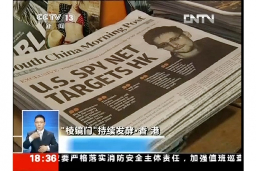 CCTV News reports on the Post''s exclusive interview with ex-CIA operative Edward Snowden, who is in hiding in Hong Kong. Photo: SCMP