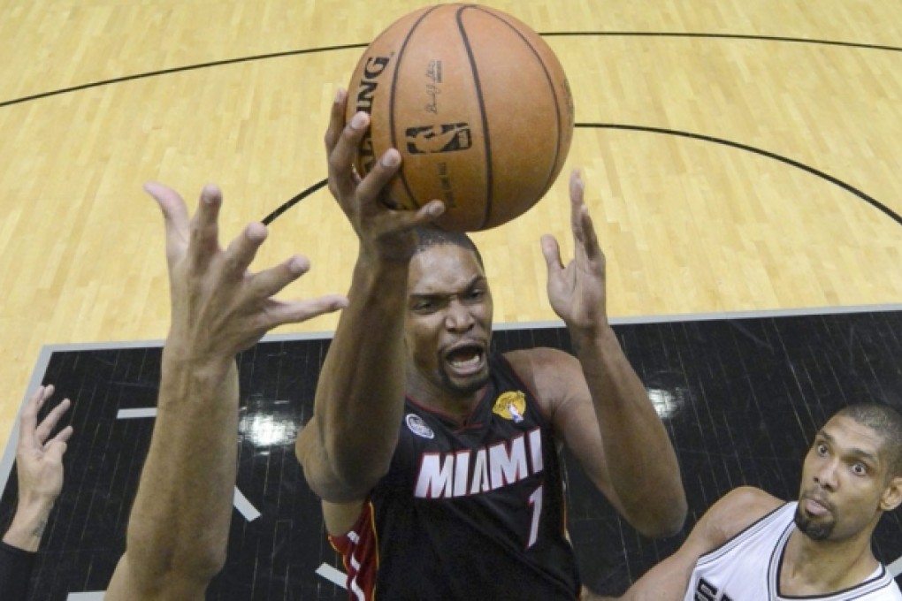 Miami Heat's Chris Bosh (centre). Photo: Reuters
