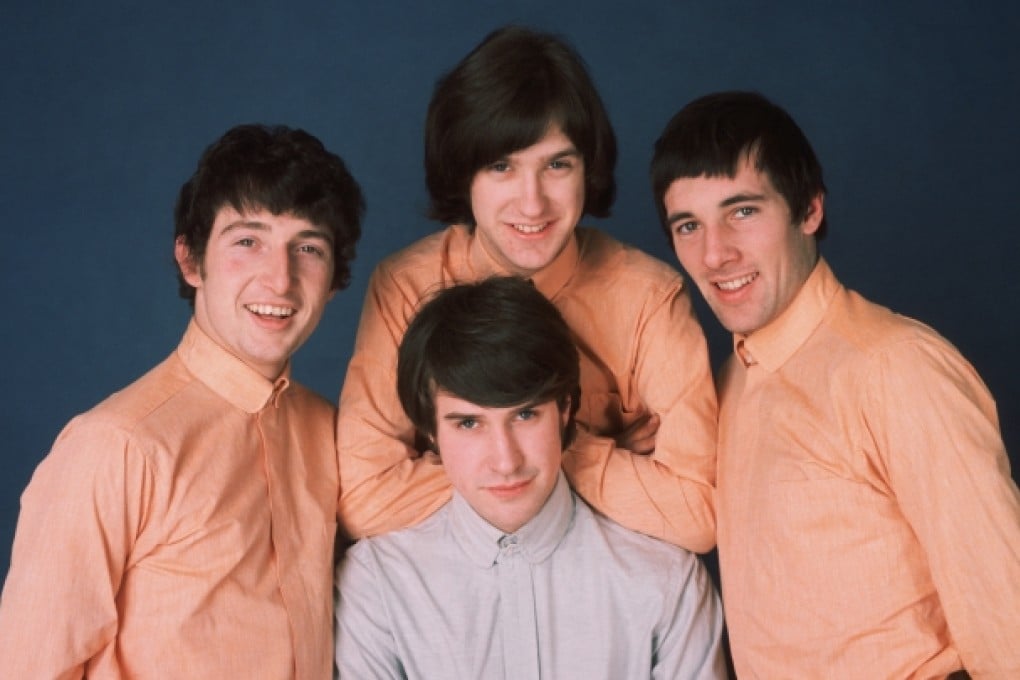 The Kinks in 1965, with Dave Davies behind his brother Ray. Photo: Hulton-Deutsch Collection/Corbis