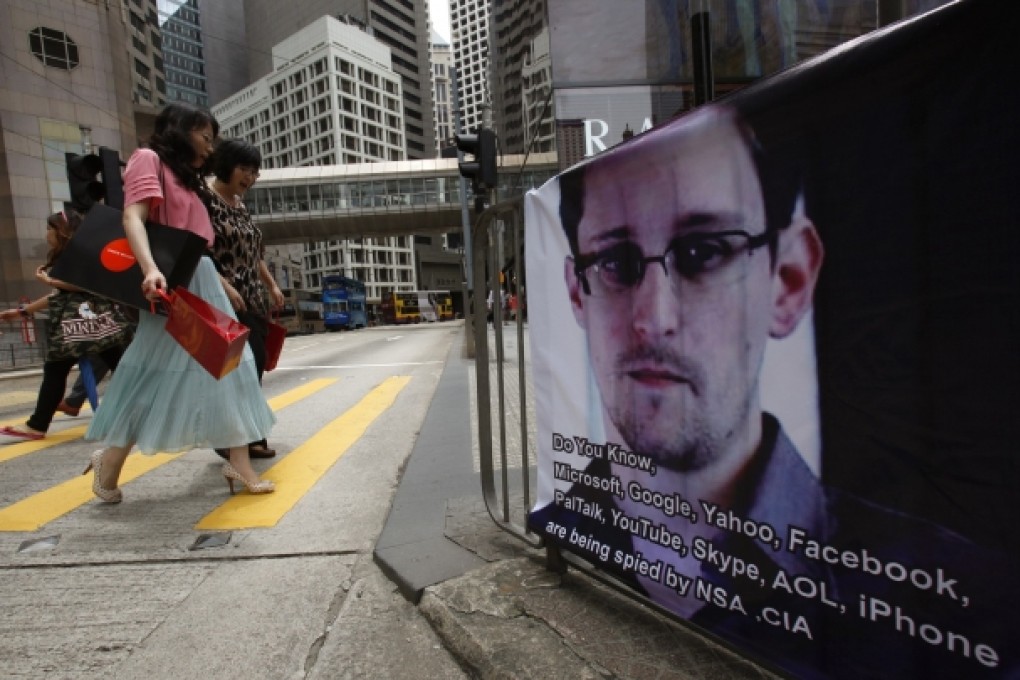 A poster supporting Edward Snowden is displayed in Hong Kong. Photo: Reuters