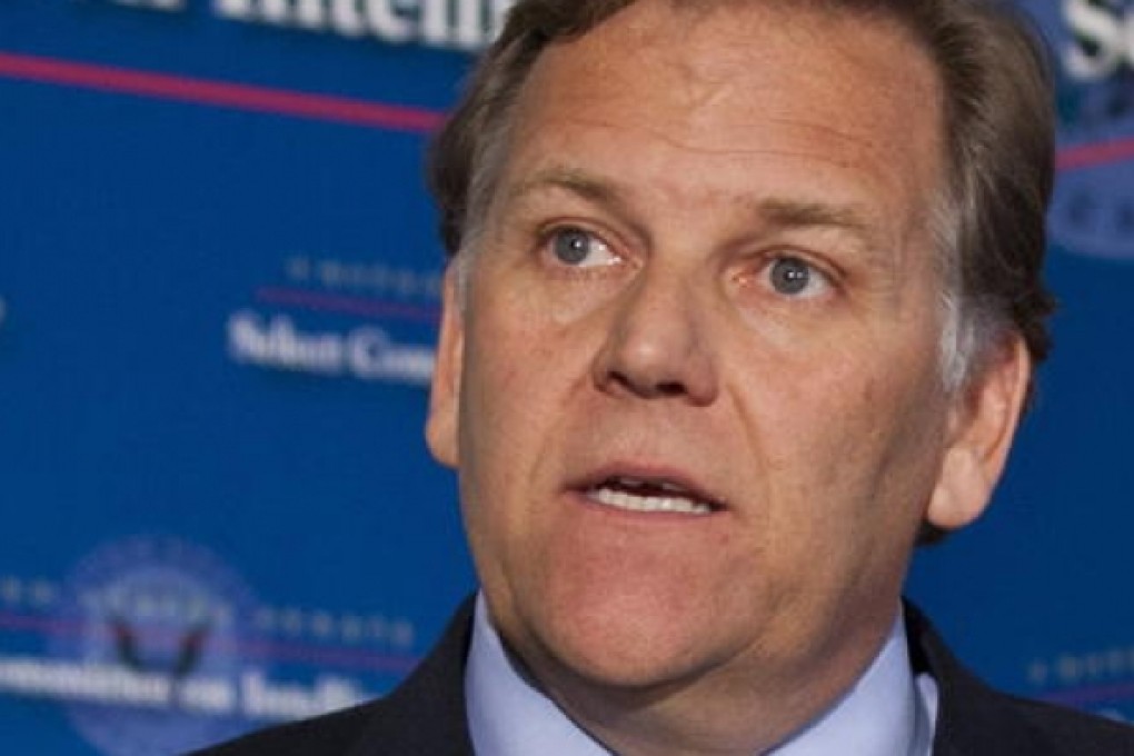 US Congressman Mike Rogers (centre)