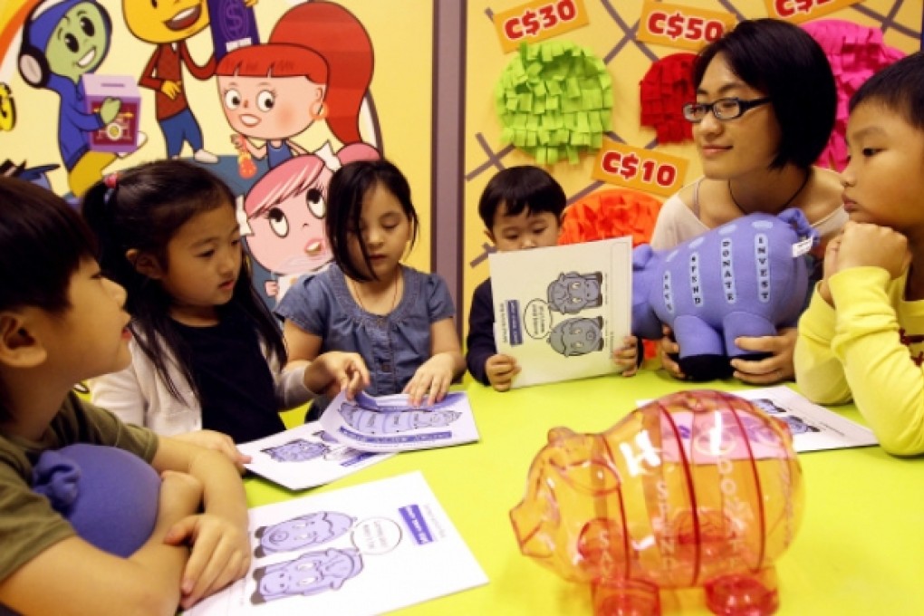 Vivian Ho teaching a Money Savvy programme. Photo: Jonathan Wong