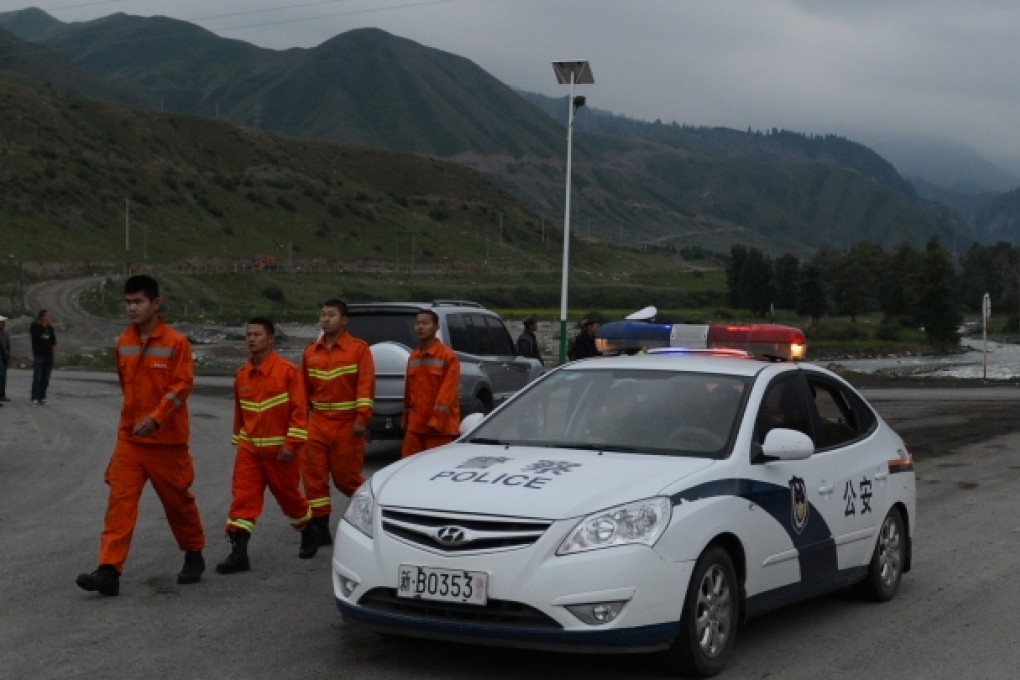 Firefighters are seen near the accident site in Changji City, northwest China's Xinjiang Uygur Autonomous Region. Photo: Xinhua