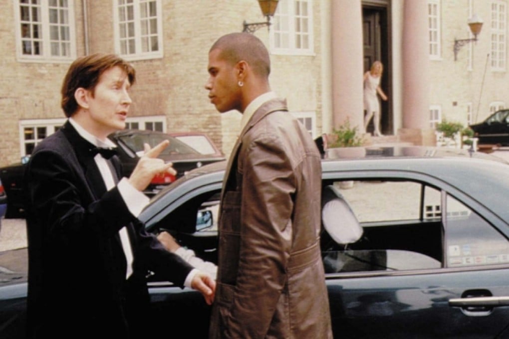 Thomas Bo Larsen (left) and Gbatokai Dakinah clash in The Celebration. Photo: HKIFF Society