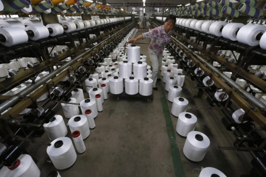 Production at mainland factories dropped to an eight-month low of 48.8 this month from 50.7 in May amid falling export orders and soaring credit costs. Photo: Reuters