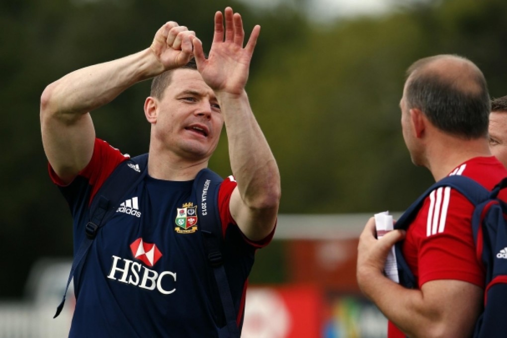 British and Irish Lions player Brian O'Driscoll talks to members of the coaching staff during a training session in Brisbane. Photo: Reuters