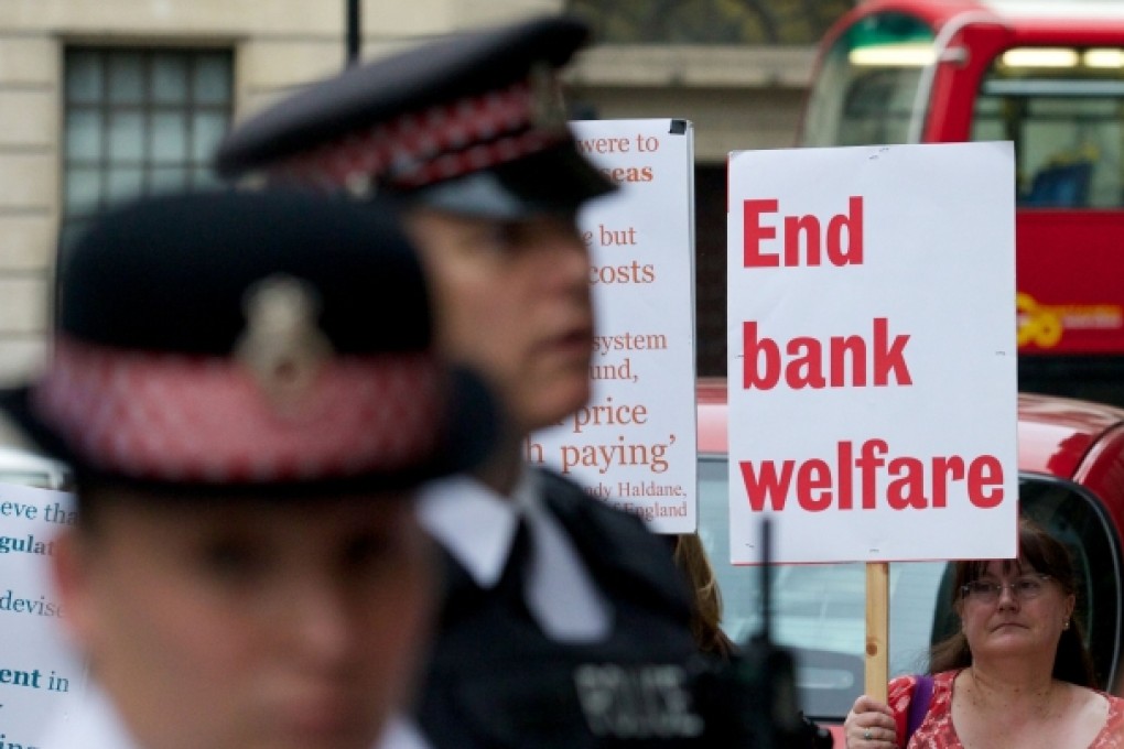 Demonstrators in London protest against bank rescues. Photo: AFP