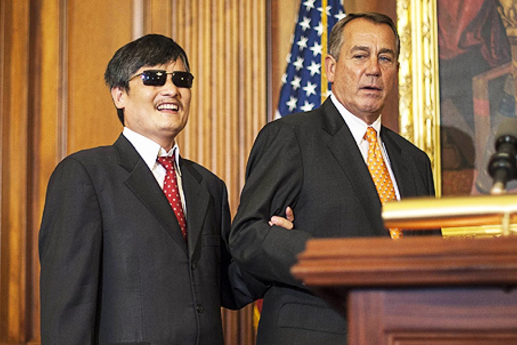 Chinese dissident activist Chen Guangcheng with US lawmaker John Boehner in 2012. Photo: AFP