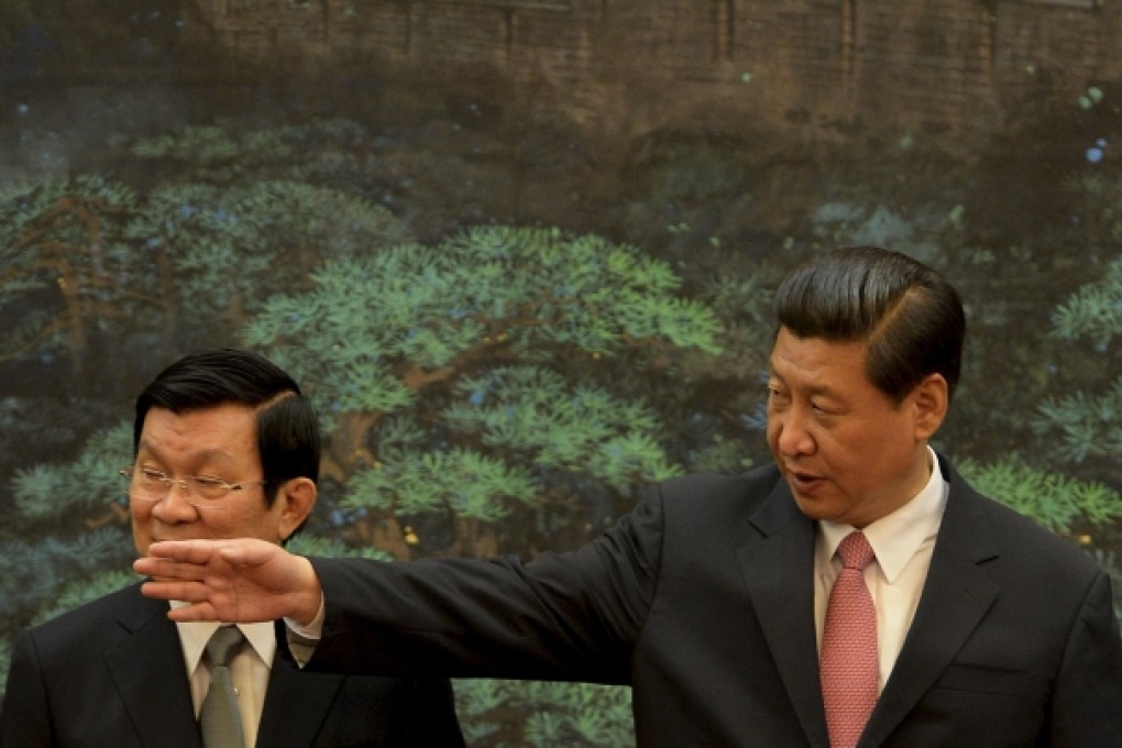 Vietnamese President Truong Tan Sang and Chinese President Xi Jinping attend a signing ceremony at the Great Hall of the People in Beijing, June 19, 2013. Photo: AP