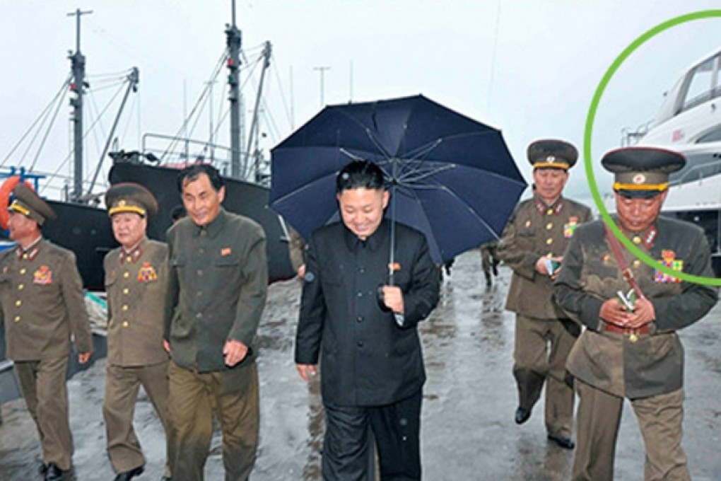 This KCNA photo shows Kim Jong-un inspecting the fishery station at Wonsan on North Korea''s east coast last month. The luxury yacht, circled in green by NK News, is seen in the background. Photo: SCMP