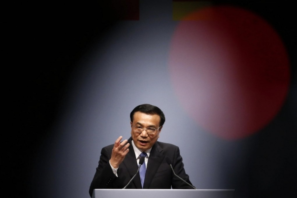 Premier Li Keqiang says greater attention must be paid to containing risks in the country's financial system. Photo: AFP